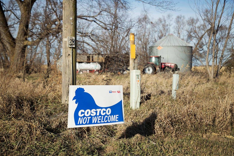 Randy and Nancy have posted a sign on their farm, which is located about 5 miles north of Fremont, Nebraska, that highlights their dislike of a Costco chicken plant being built in Fremont. The sign is seen here on Wednesday, Nov. 22, 2017.